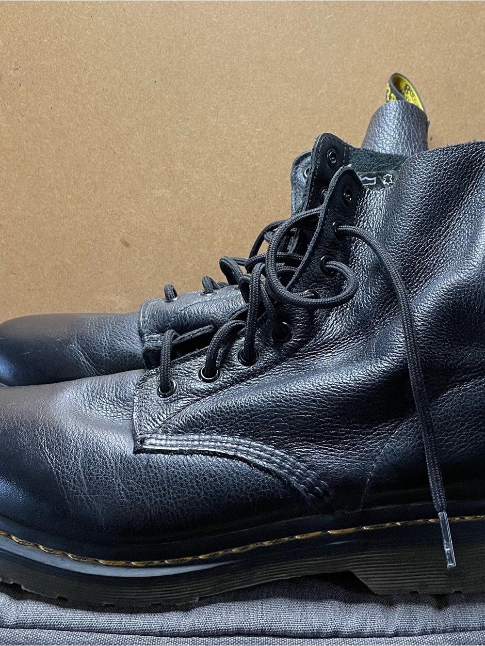 Dr. Martens Black Pebbled Leather Lace-Up Combat Boots with Yellow Heel Loop
